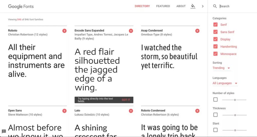 Designer comparing different font styles and sizes on a computer screen