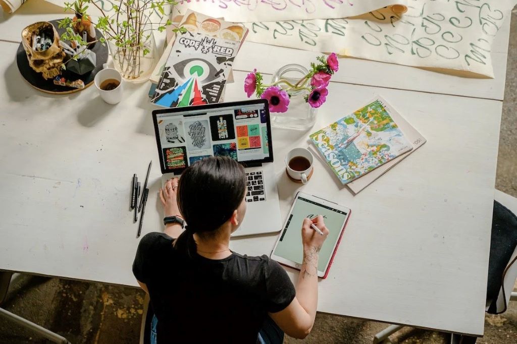 Marketing team developing eye-catching digital graphics for online growth in California